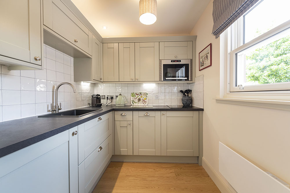The kitchen in our Courtyard Apartment. accessible accommodation in Inverness
