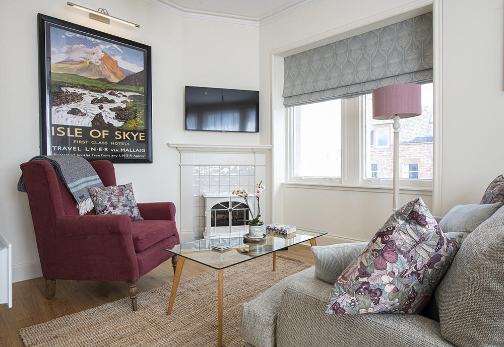The living room in the Isle of Skye Serviced Apartment, Inverness