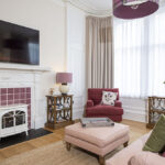 The cosy living room in our Scottish Thistle Serviced Apartment, Inverness