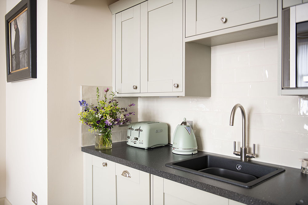 The kitchen area in our Running Hare Serviced Apartment Inverness
