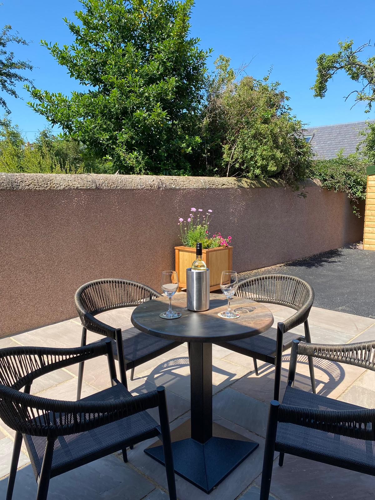 The patio at The Courtyard serviced apartment Inverness