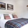 TH BED 1000px King sized bedroom, Tree House within Art House Apartments Inverness